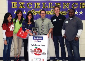 TEACHER AWARD - Prairie View Elementary fourth-grade teacher Samera Doroodchi (third from left) received the KLTY Teacher of the Month for September. KLTY and CareNow representatives presented Doroodchi with a plaque and other prizes at a school assembly Oct. 9. Pictured are KLTY Senior Account Executive Eva Royer; Care Now Promotions Jillian Wood; Doroodchi; Prairie View Principal Sandy Conklin; KLTY Morning Show Producer John Rothwell and KLTY Assistant Promotions Director Nakia Reeder. Submitted photo