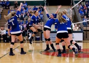 BIG PLAY - Caroline Lowery reacts after one of her 10 kills Saturday. Messenger photo by Jimmy Alford