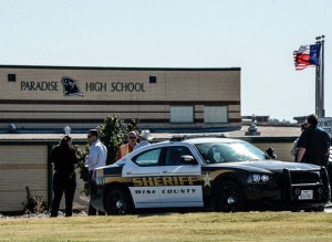 BOMB THREAT - Students at Paradise High School were evacuated late Friday morning after a bomb threat was found scrawled on the stall in a bathroom. Students returned to class a couple of hours later after a thorough search turned up no explosives and emergency responders cleared the scene. Messenger photo by Joe Duty