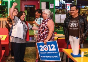 CELEBRATE TONIGHT - Tracy Smith along with several other Wise County Democrats shout for their candidate's re-election.