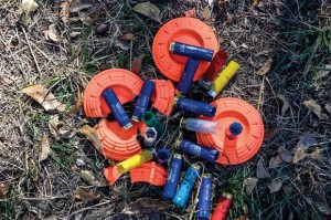 CLAY PIGEONS - Targets and shotgun shells sit on the ground. Veteran Tim Seckel, of Newark, uses shooting as his therapy. Messenger photo by Joe Duty