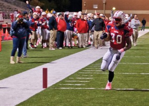 CROSSING THE LINE - Northwest's Emmanuel Moore runs in a touchdown in the Texans'  victory over the Falcons October 26. Messenger photo by Jimmy Alford