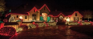 DAZZLING DISPLAY - Christmas lights highlight the landscaping at the home of James and Shirley Wood. Messenger photo by Joe Duty