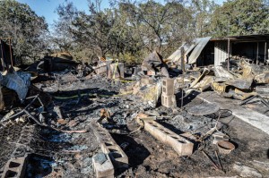 FATAL FIRE - A fire that destroyed a mobile home between Cottondale and Boyd early Sunday morning, killed the home's only occupant, Henry Crowson. When a neighbor discovered the fire just before 5 a.m., the home was fully involved. Messenger photo by Joe Duty