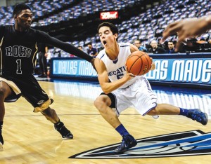 GOING DOWNTOWN - Decatur's Parker Slate takes the ball toward the basket. Messenger photo by Joe Duty
