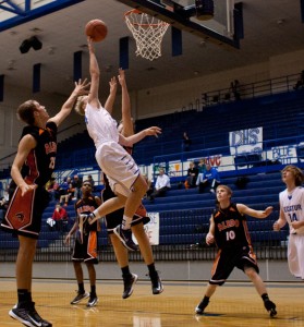 HIGH FLYING - Decatur's Cain Lowe guides in for a lay-up against Aledo Tuesday. The Eagles fell to the Bearcats, 68-43. Messenger photo by Jimmy Alford