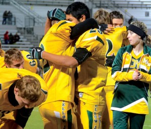 SEASON'S END - Fino Cardona and Michael Partin embrace after Boyd's area round playoff loss to Winnsboro Friday in Rockwall. Messenger photo by Mack Thweatt