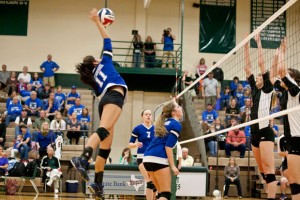 TAKING CHARGE - Makayla Mayfield delivers one of her 17 kills during the Region II final Saturday against Argyle. Messenger photo by Jimmy Alford