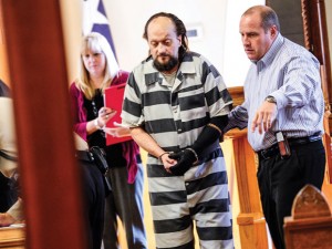 CONVICTED - Mark Schomburg is led from the courtroom in November after being sentenced to 40 years for killing Susan Whisenant at his Paradise home in 2011. Messenger photo by Joe Duty