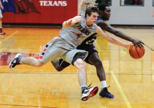DEFENSIVE STOP - Northwest's Casey Jimison steals the ball against Paschal Friday. The Texans held on for a 55-42 victory. Messenger photo by Joe Duty