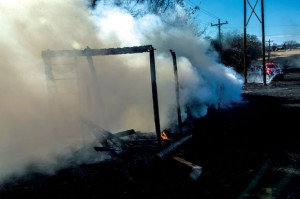 FIRE DANGER - Boyd, Cottondale, Rhome, Decatur and Newark fire departments responded to grass fire on Kristi Lane, north of Boyd, that scorched 12 acres, 20 round hay bales and cause slight damage to a home Sunday afternoon. Messenger photo by Joe Duty