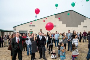 FLY AWAY - Members of Chisholm Trail Baptist Church in Rhome released red, green and white balloons last Saturday in memory of Daniel Barnes. Messenger photo by Joe Duty
