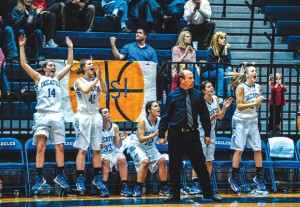 GOOD TIMES - The Decatur bench celebrates after Katie Isham hit the game winning shot against Muenster. Messenger photo by Joe Duty