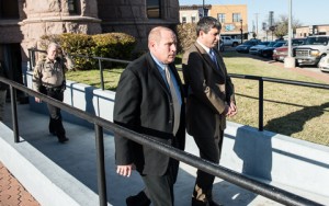Mark J. Shumski is led out of the courtroom after his conviction and sentencing. Messenger photo by Joe Duty.