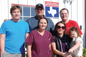 RIBBON CUTTING - The Decatur Chamber of Commerce hosted a ribbon cutting Nov. 8 for M&M Vehicle Inspection in Decatur. Pictured are Donald McMaster and family.