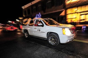ROYAL WAVE - Mrs. Senior Wise Nellie Redwine waves to the crowd gathered for Bridgeport's lighted Christmas parade Saturday. Redwine earned the title at the Taste of Wise Look Local event in September. Messenger photo by Joe Duty