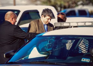 TAKEN AWAY - After a three-day trial in Decatur, Mark J. Shumski, 45, of Rhome, is taken away in handcuffs Thursday after being sentenced to 60 years in prison. He was convicted of sexually abusing a girl under 14 years of age over a three-year period. Messenger photo by Joe Duty