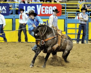 TUF ON TOP - After a pair of first place finishes in Vegas, Tuf Cooper, 22, of Decatur, is back in the lead and in position to win a second consecutive tie-down world championship. Photo by Kirt Steinke/Western and Rodeo Images