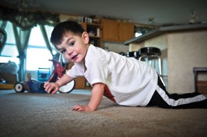 YOUNG STRENGTH - Zaiden Davis, 2, shows resilience in his battle with congenital heart disease. Messenger photo by Joe Duty
