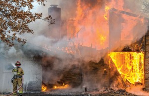 BRINGING IT HOME - Michael and Ashly Dobyns of Decatur lost almost everything in a fire Wednesday morning. Michael is a firefighter with Grapevine Fire Department and had just gotten home from a night shift when he learned his home had caught fire. Messenger photo by Joe Duty