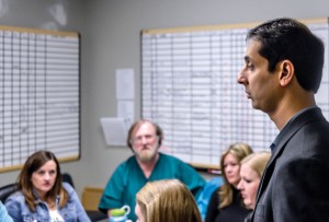 COLLABORATING HELP - Haroon Siddique leads a staff meeting of the behavioral health department at Wise Regional Health System in Decatur. The psychiatrist is the medical director of a staff that includes a program director, social workers, clinical therapists, social workers, psychiatric nurses and counselors. Messenger photo by Joe Duty