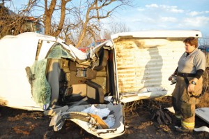 EARLY START - Jaskavan Dhillon, 41, of Fort Worth was northbound at a high rate of speed on a narrow county road south of Rhome when he lost control of his pickup and rolled it. Messenger photo by Joe Duty