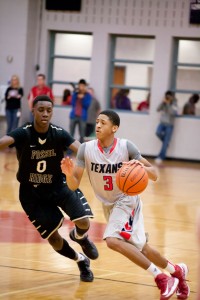 MAKING HIS WAY - Northwest's Josh Tatum scored 16 points to help the Texans lead Fossil Ridge. Messenger photo by Jimmy Alford