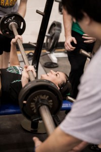 RAISING THE BAR - Paradise's Ashley Sparks takes part in the bench press at the Chico Powerlifting Meet Saturday. Sparks finished fourth in her class. Messenger photo by Jimmy Alford