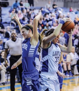 RIPPED AWAY - Decatur's Haley Dennard and the Lady Eagles had a tough time with Krum's defense Friday. The Lady Cats took the 55-29 victory.  Messenger photo by Joe Duty