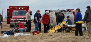 SAD SCENE - Emergency responders and investigating officers responded to a wreck Friday morning that killed an infant and sent two more to a Fort Worth hospital by helicopter. Messenger photo by Joe Duty