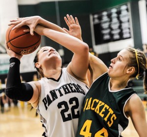 STINGING DEFENSE - Boyd's Kenzie Elkins goes in for the block against Paradise's Makenna Burt Tuesday. The Lady Panthers held on for the 57-44 win. Messenger photo by Joe Duty
