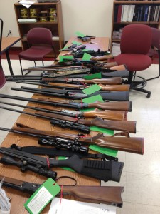 STOCKED UP - Bridgeport police confiscated 13 firearms and lots of ammunition from the home of James Warden, 43, after a tense standoff ended peacefully Tuesday morning.
