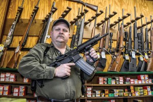 THE NEW CURRENCY - Bridgeport Guns and Ammo owner Brian Bernardo said he's seen a tremendous spike in the sale of guns and ammunition since the president began pushing tough gun legislation. Bernardo is also in law enforcement, and he believes stricter gun legislation does not keep weapons out of the hands of criminals. Messenger photo by Joe Duty