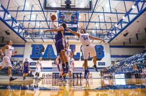 TOUGH DEFENSE - Decatur's Shayler Carlton and Parker Slate go in for the block against Sanger. Messenger photo by Joe Duty
