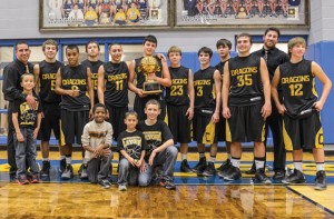 ALL SMILES - The Chico Dragons celebrate their first playoff win in 15 years after their 54-46 bi-district win over Meridian Tuesday. Messenger photo by Joe Duty