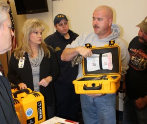 EQUIPPED - Wise Regional Health System's director of radiology, John Neal, who is also the Paradise fire chief, was instrumental in obtaining the donation of an AED to every local department. Departments also receive an AED from the county. "Those AEDs are kept on the trucks that respond to medical emergencies, not on the trucks that are used for fires, accidents, rescue, etc.," he said. "Carrying that logic forward, heart attack is the No. 1 killer of firefighters, and very few of (those) heart attacks occur on medical calls. Therefore, when firefighters die, we are not equipped to save our own." Submitted photo