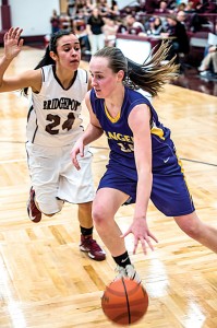 FAREWELL - Bridgeport senior Sabrina Garza applies the defense in her final home game. The senior ended the night with 20 points and 10 rebounds. Messenger photo by Joe Duty