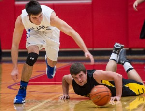 OUT OF REACH - Chico's Dylan Hightower watches the ball and the season roll away as the Dragons fall in the area round, 67-50 to Stamford. Messenger photo by Joe Duty