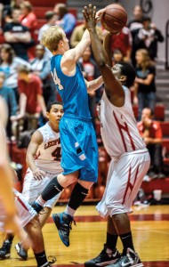 QUICK PASS - Cain Lowe finds the open man against Gainesville Friday. Messenger photo by Joe Duty