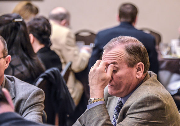 SCHOOL HEADACHES NOT OVER - Although Texas' public school finance system has been ruled unconstitutional, the system is unlikely to get fixed during this session - reason for the furrowed brow of Decatur ISD Superintendent Rod Townsend at Tuesday morning's Wise County Legislative breakfast in Austin. Messenger photo by Joe Duty