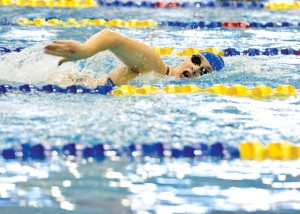 STATE BOUND - Decatur's Katey Rowden swims to a first place finish in the 50 freestyle at the regional meet in Mansfield Saturday. With the victory, Rowden will advance to the state meet next week. Messenger photo by Joe Duty