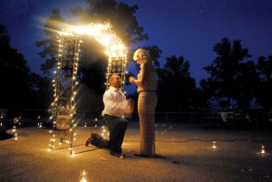 THE PROPOSAL - Jerrod proposed to Ashlee in her backyard on July 14, 2012. "It was ultimately breathtaking," Ashlee said. "There were lights and candles surrounding my whole backyard. Jerrod was waiting for me under an archway of lights." Submitted photo