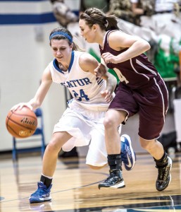 TIGHT DEFENSE - Decatur's Haley Dennard tries to get around the defense of Bridgeport's Bailey Thompson. Messenger photo by Joe Duty