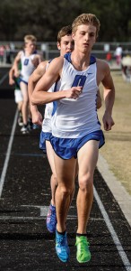 IN CONTROL - Michael Smyers takes an early lead over teammate Taylor Clayton in the 3200 meter run Thursday at Bridgeport. Clayton went on to win the event while Smyers finished second. Messenger photo by Joe Duty