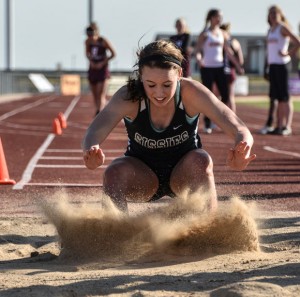 NICE LANDING - Bridgeport's Bailey Thompson splashes the sand in the long jump pit at the Sanger Meet Thursday. Messenger photo by Joe Duty