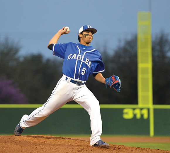 SETBACK - Decatur's Johnny Murillo delivers a pitch during the first inning Friday against Krum. The Eagles lost their first district game, 11-4. Messenger photo by Joe Duty