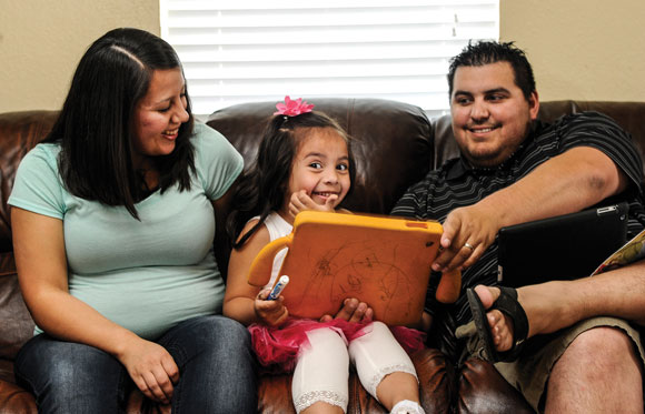 A NEW START - Elda Flores, is expecting a baby boy in June, said family became her focus when she couldn't explore a career in nursing. Messenger photo by Joe Duty