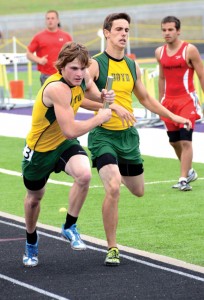 ANCHOR LEG - Dylan Noel takes the final handoff in the mile relay Wednesday. Boyd went on to a second-place finish. Messenger photo by Mack Thweatt