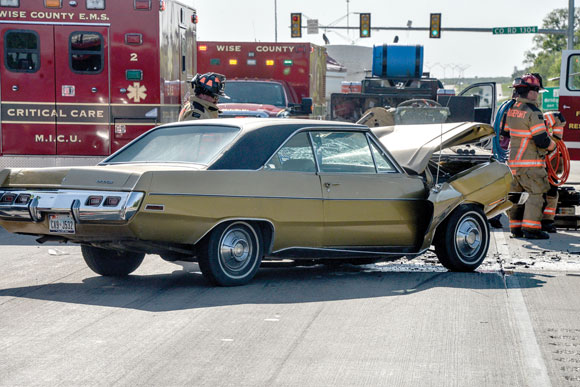 ENTRAPPED - On Friday afternoon, Carol A. Fewell, 66, of Azle, wrecked into the back of a tractor trailer stopped at U.S. 380 and County Road 1304. Fewell had to be cut from the vehicle. She remained hospitalized as of Tuesday afternoon. Messenger photo by Joe Duty