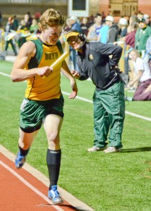 FIRST PLACE - Boyd's Dylan Noel finishes off a Yellowjacket victory in the mile relay. Messenger photo by Mack Thweatt